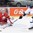 OSTRAVA, CZECH REPUBLIC - MAY 3: Slovakia's Marek Viedensky #25 reaches for a loose puck in front of Belarus' Kevin Lalande #35 during preliminary round action at the 2015 IIHF Ice Hockey World Championship. (Photo by Richard Wolowicz/HHOF-IIHF Images)

